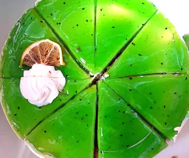 Ración de cheese cake de kiwi